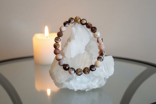 Picture Jasper Bead Bracelet 8mm round stones on a crystal, with a candle