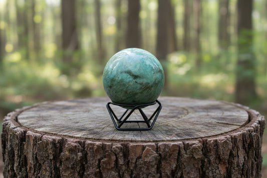 amazonite crystal sphere on a stand colors of the sphere pretty teal blues 