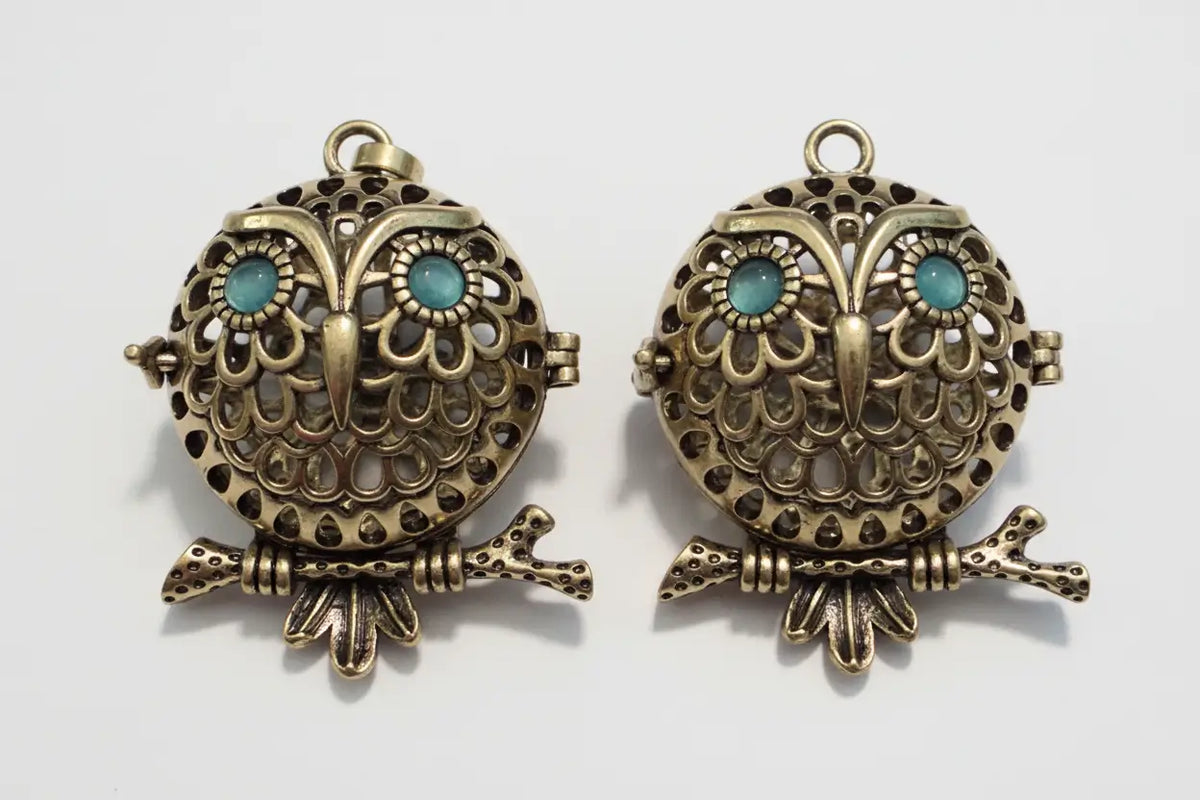 Gold tone owl crystal diffuser locket pendant with turquoise stones, boosts intuition
