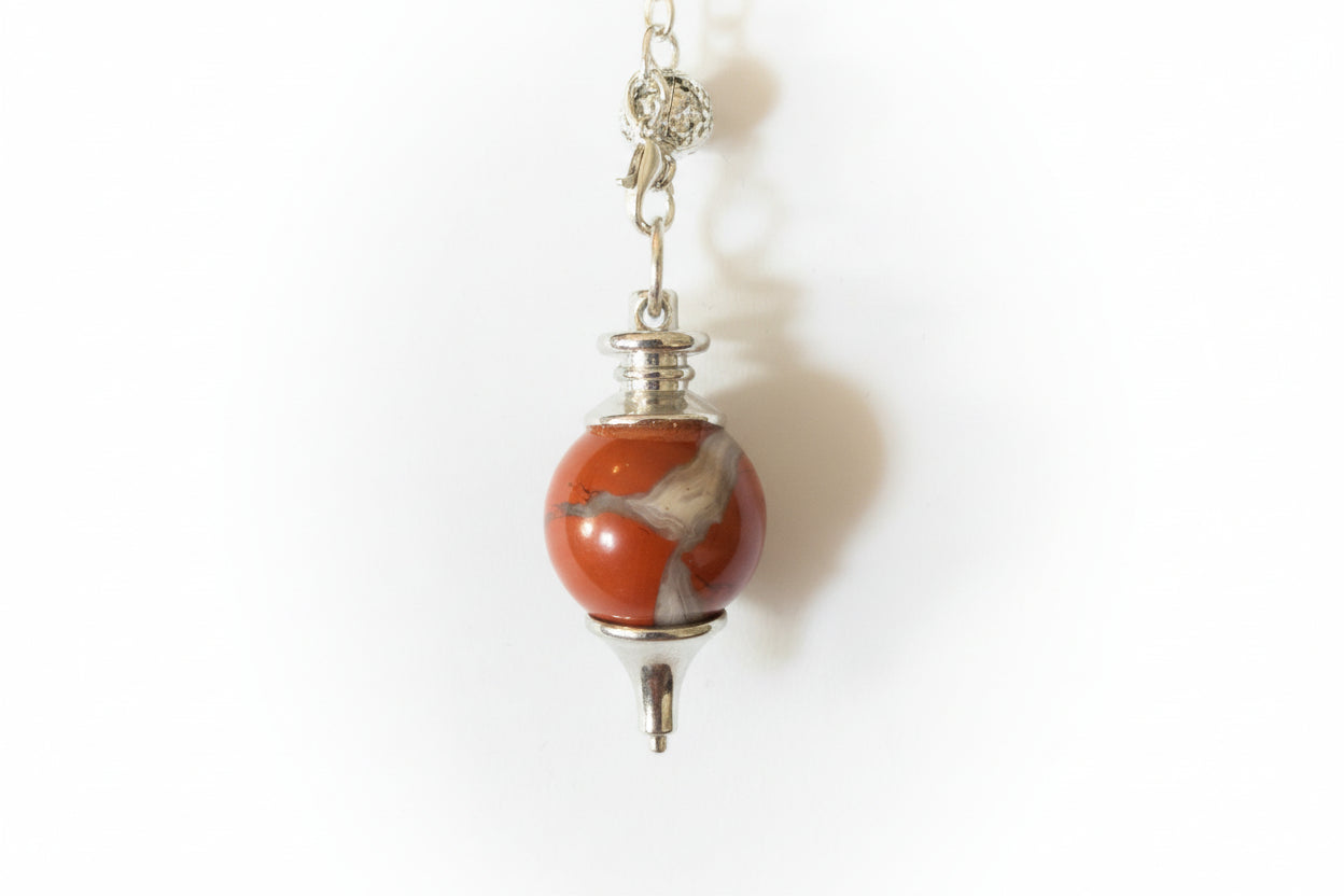 Stone sphere dowsing pendulum for energy work