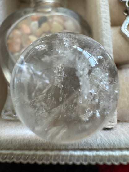 Close-up of a clear quartz crystal ball.