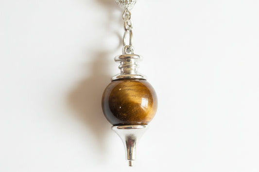 Tigers Eye stone on a chain dowsing pedulum