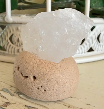 Mini quartz crystal head rock with smiling face detail