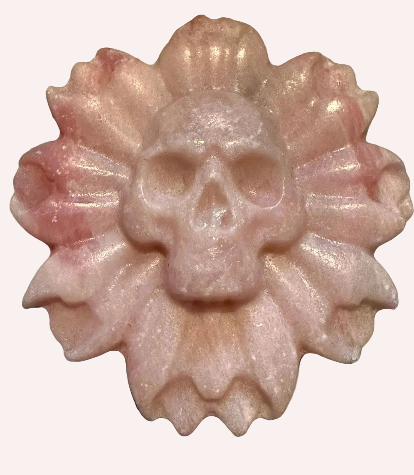 pink calcite skull on flower carving  pinks, details 