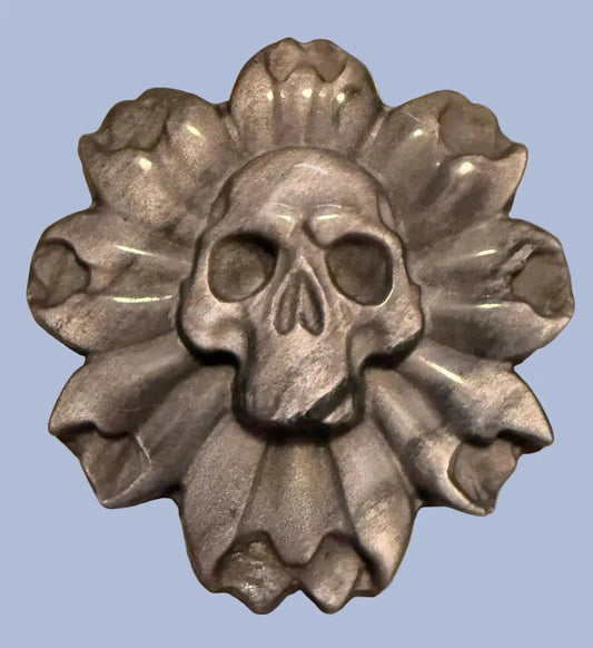 hand carved silver obsidian skull on flower deco  