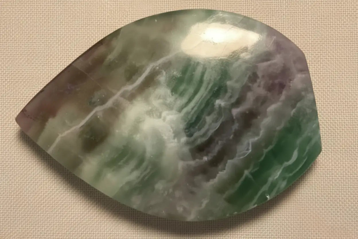 Polished fluorite freeform crystal with green and purple bands