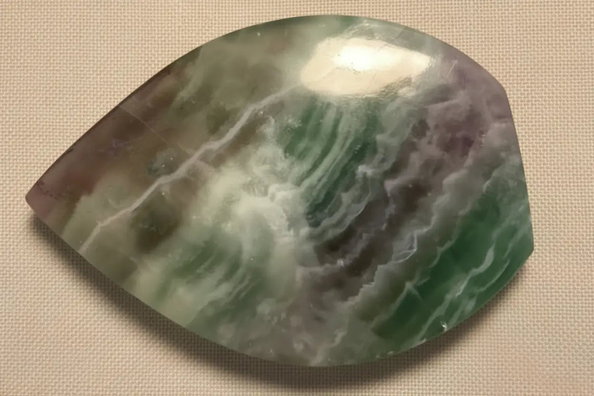 Polished fluorite freeform crystal with green and purple bands