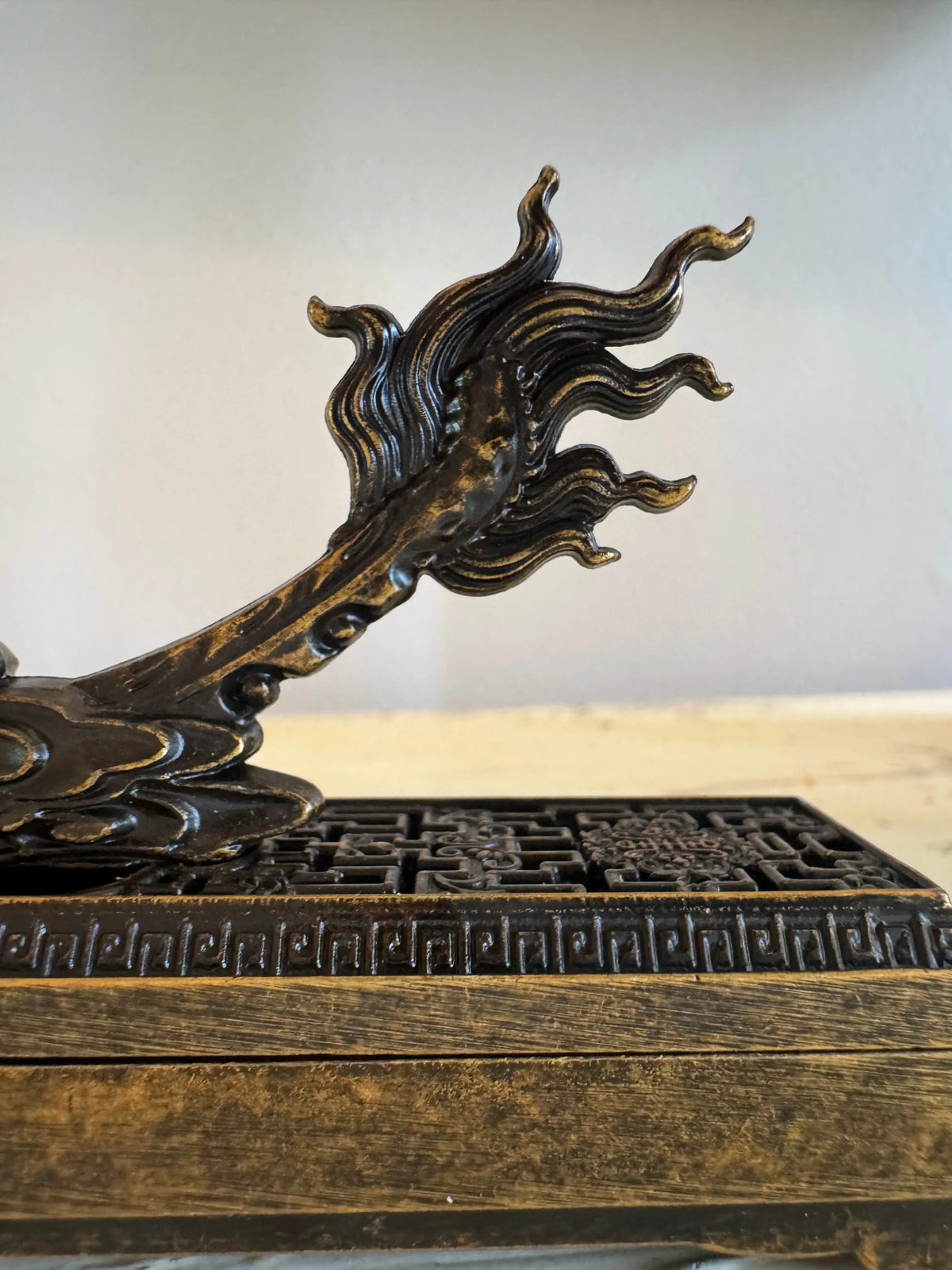Brass dragon incense burner with detailed dragon base