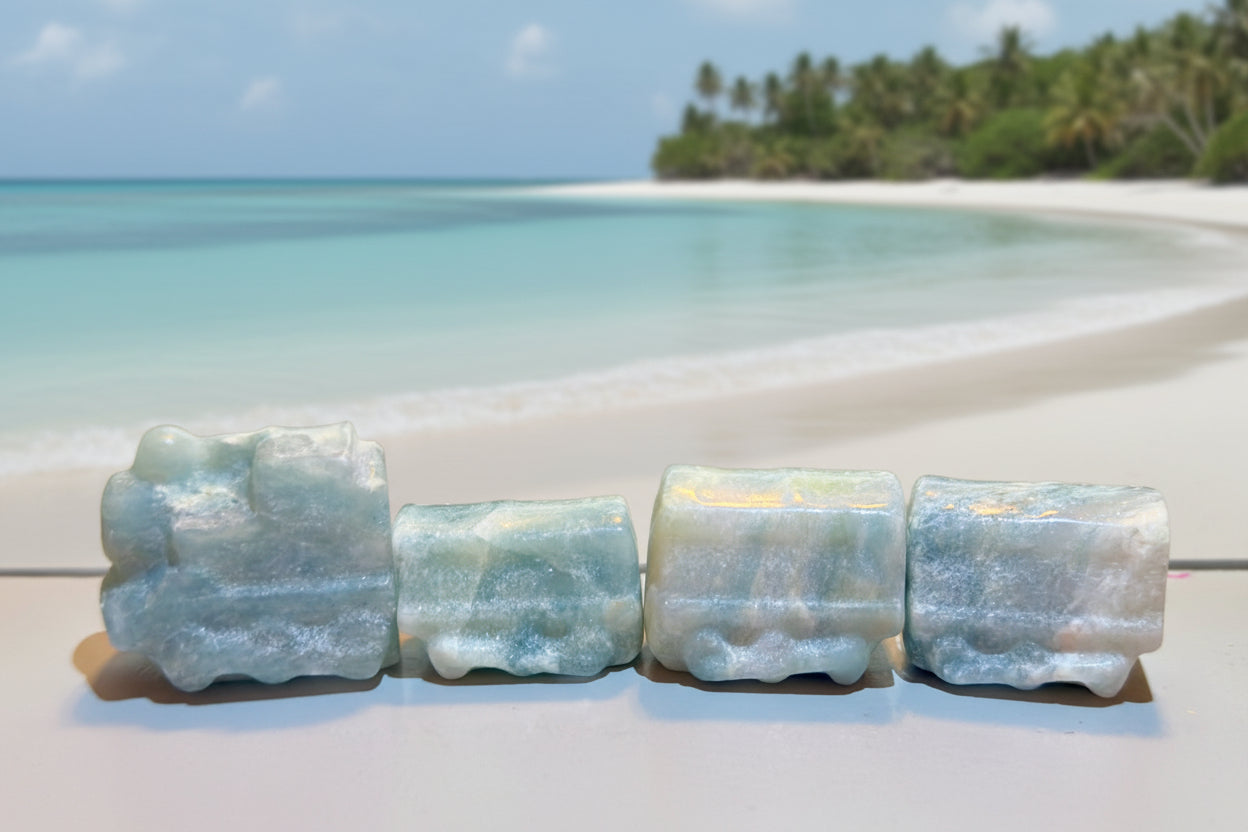 Caribbean Calcite four piece carved crystal train set