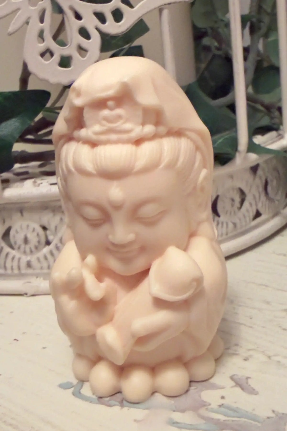 Tagua nut Hotei figure carving side view