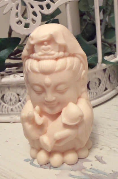 Tagua nut Hotei figure carving side view