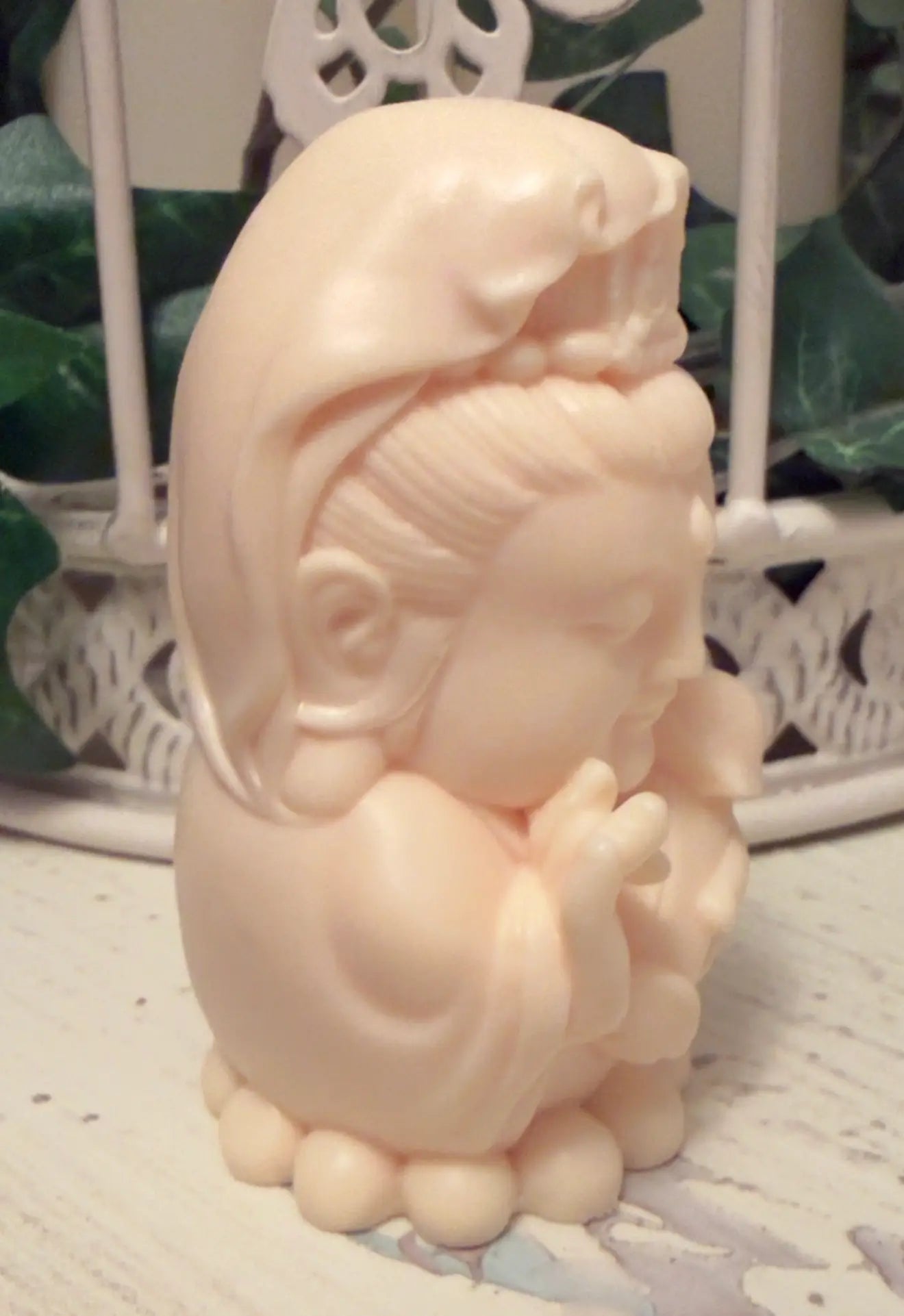 Tagua nut Hotei figure carving back view