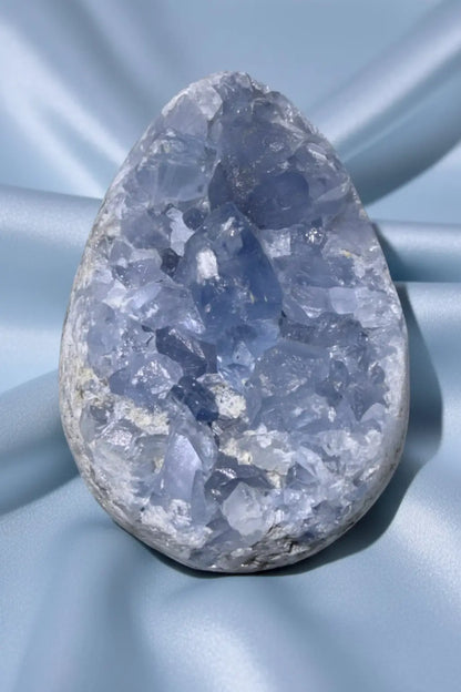 Celestine Geode on a blue cloth