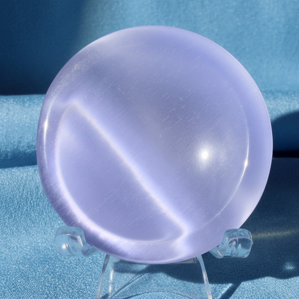 chartoyant selenite bowl close up pretty blue on a stand
