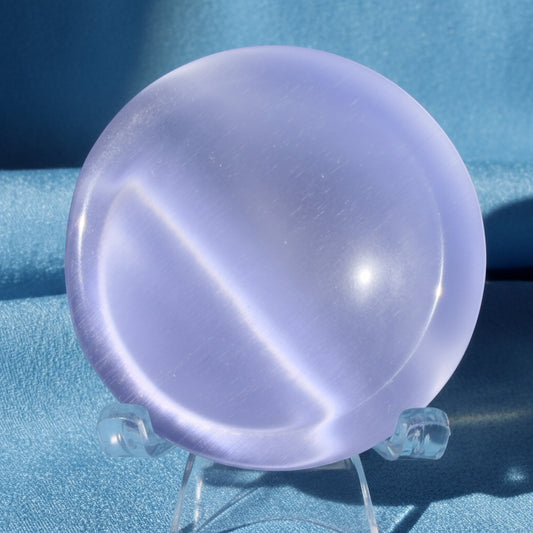 chartoyant selenite bowl close up pretty blue on a stand