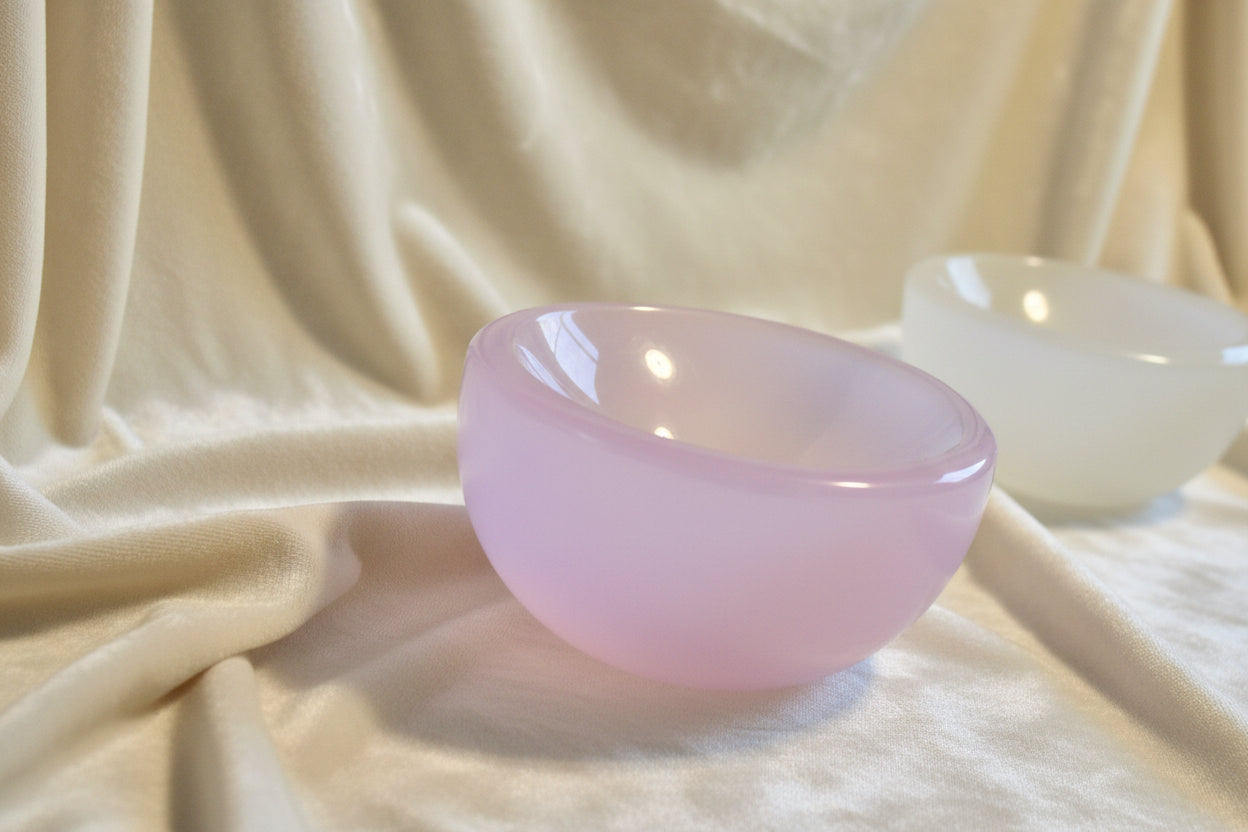 Side view of a Chartoyant Selenite petite bowl  pink 