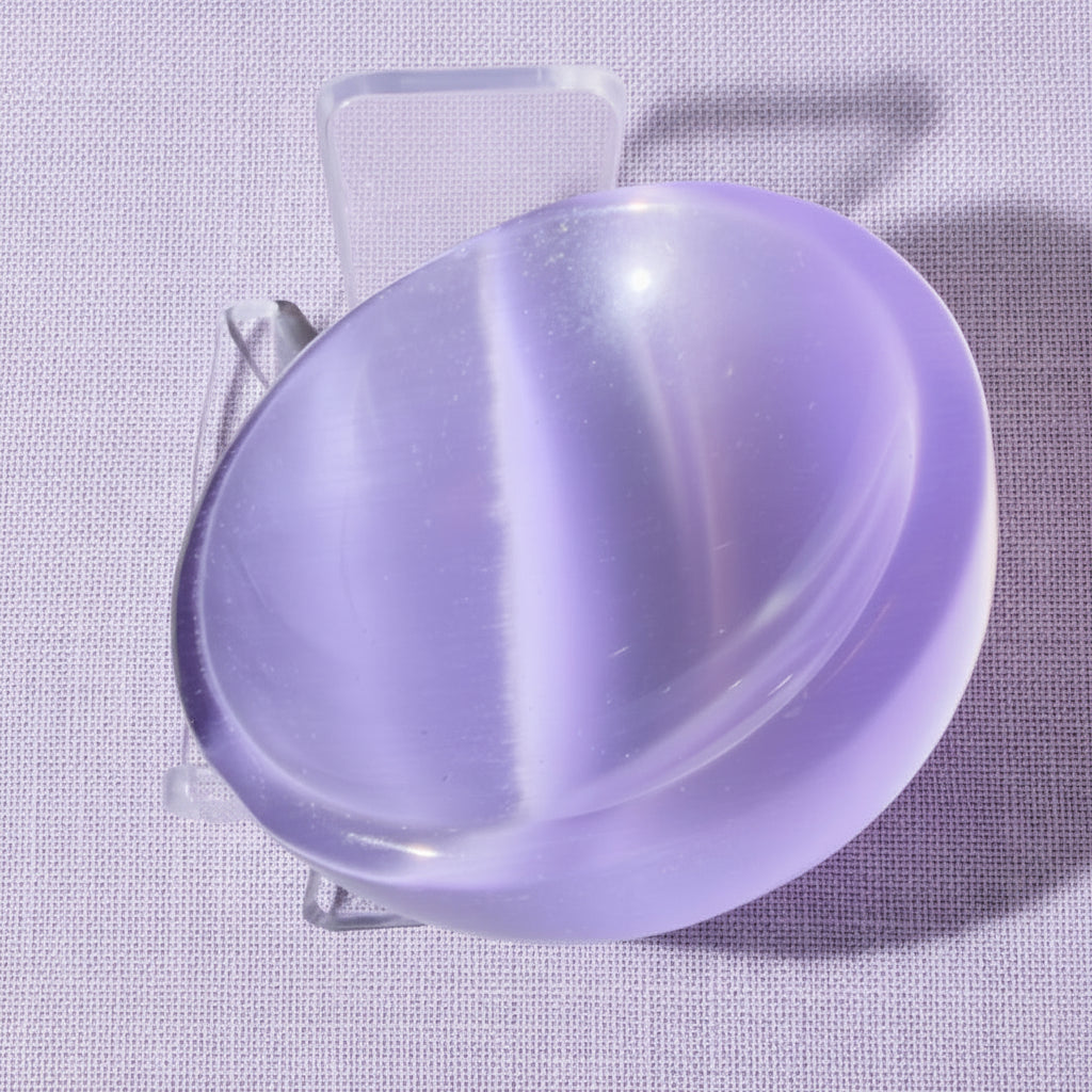 Purple chatoyant selenite petite bowl showing cats-eye effect