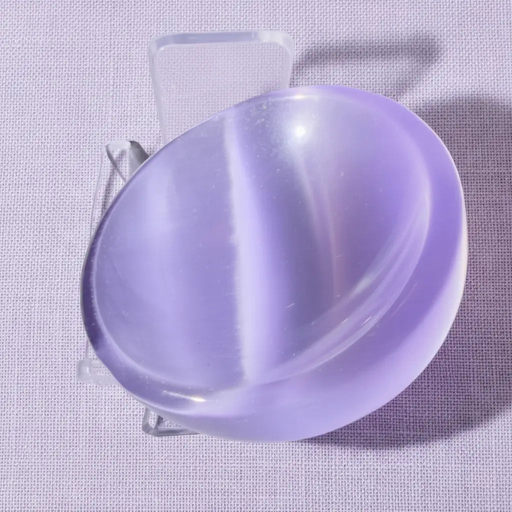 Purple chatoyant selenite petite bowl showing cats-eye effect