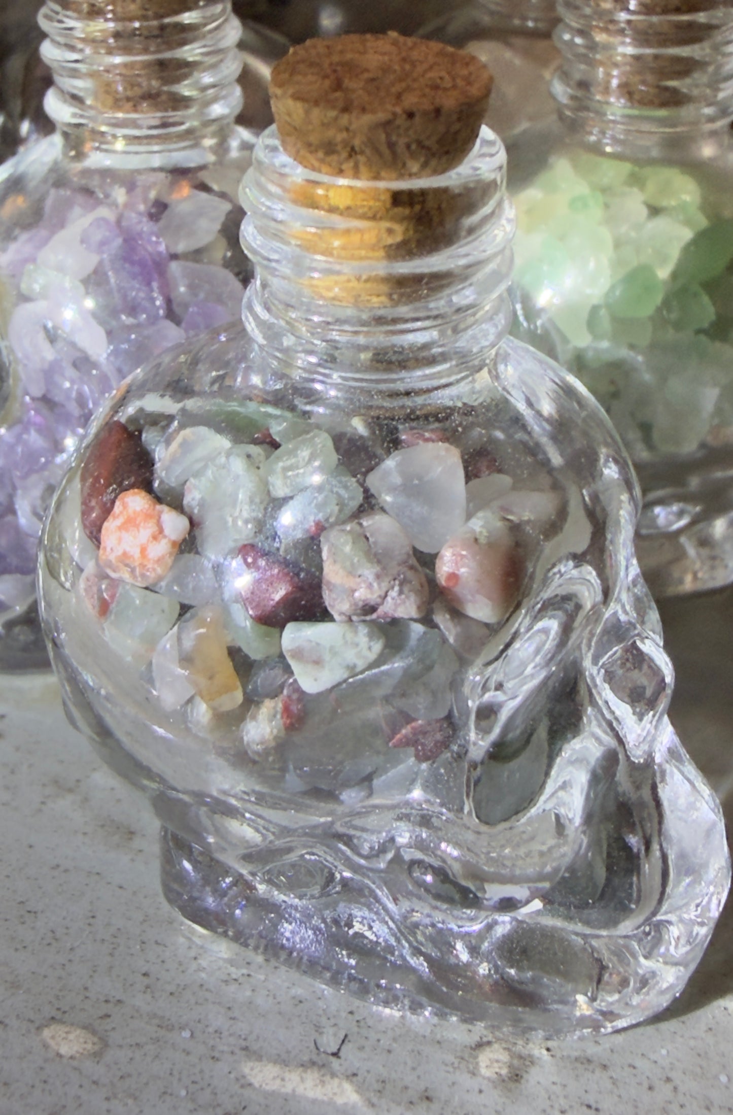 Dragons Blood chips in a skull shaped glass wish bottle 