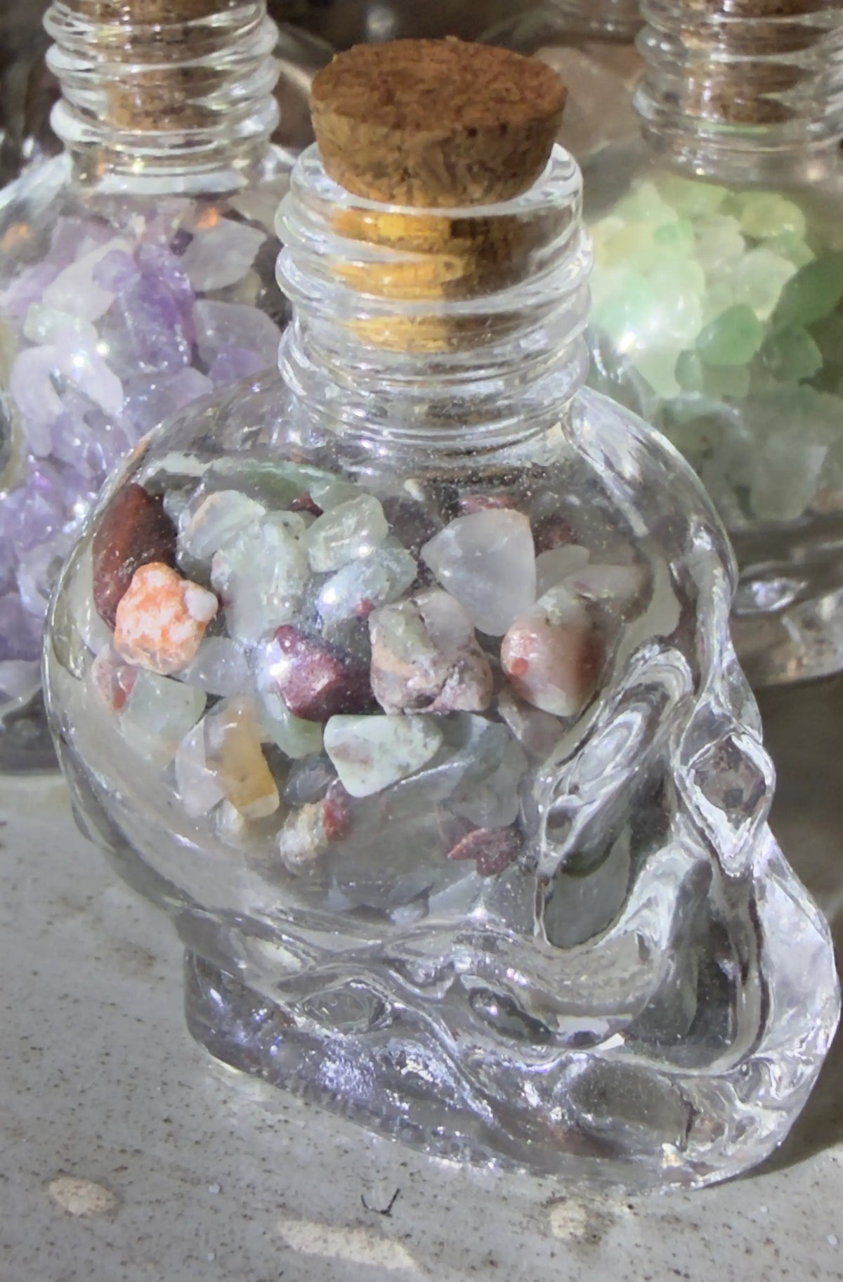Dragons Blood chips in a skull shaped glass wish bottle 