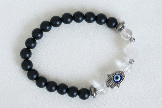 beautiful 9mm black obsidian bead bracelet, elastic, clear quartz beads, a clear quartz pyramid and hamsa hand with a spinning evil eye for protection 