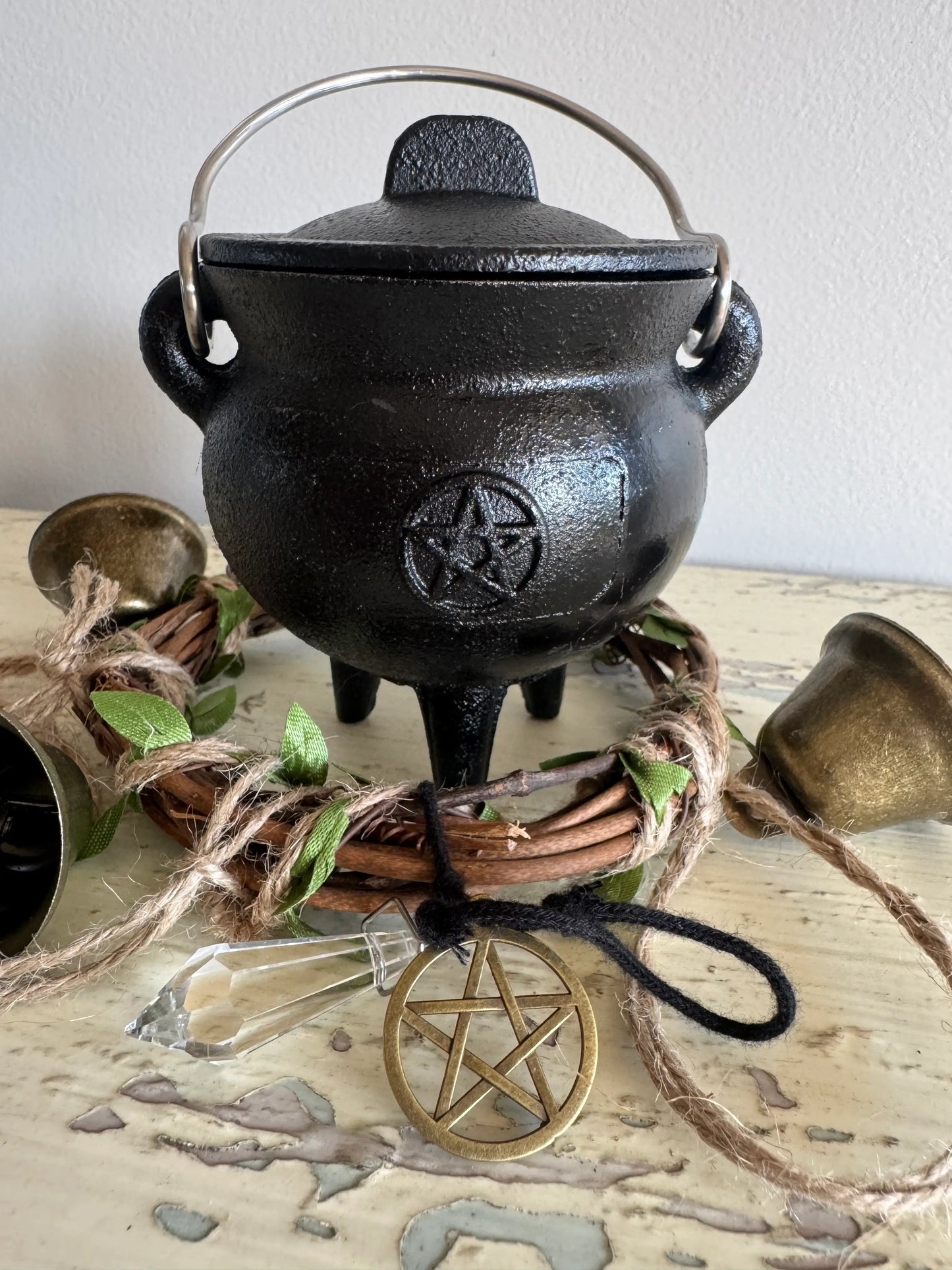 Black cast iron cauldron with Triple Moon Pentacle design