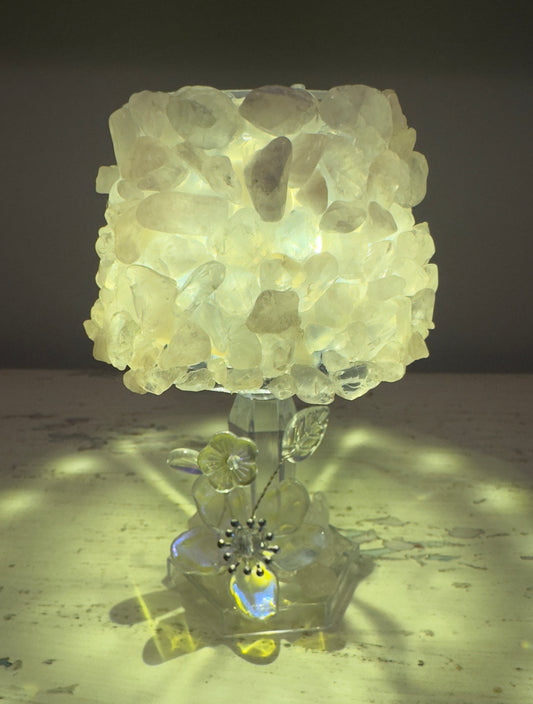 Quartz crystal lamp with flower base.