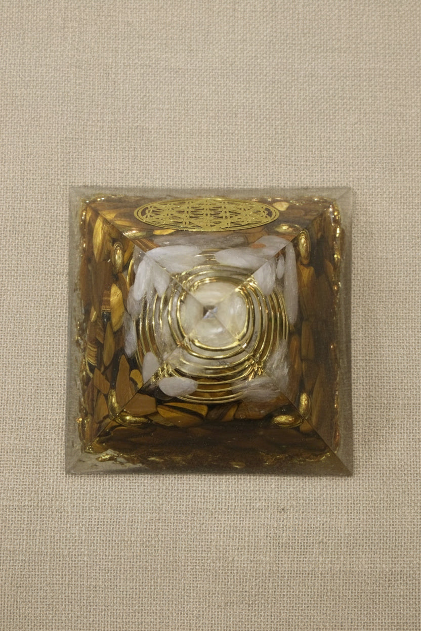 Orgonite tigers eye, clear quartz and copper bits and coil 