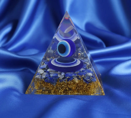 Orgonite Pyramid filled with lapis lazuli chips, copper shaving, bits and spheres. orgone energy