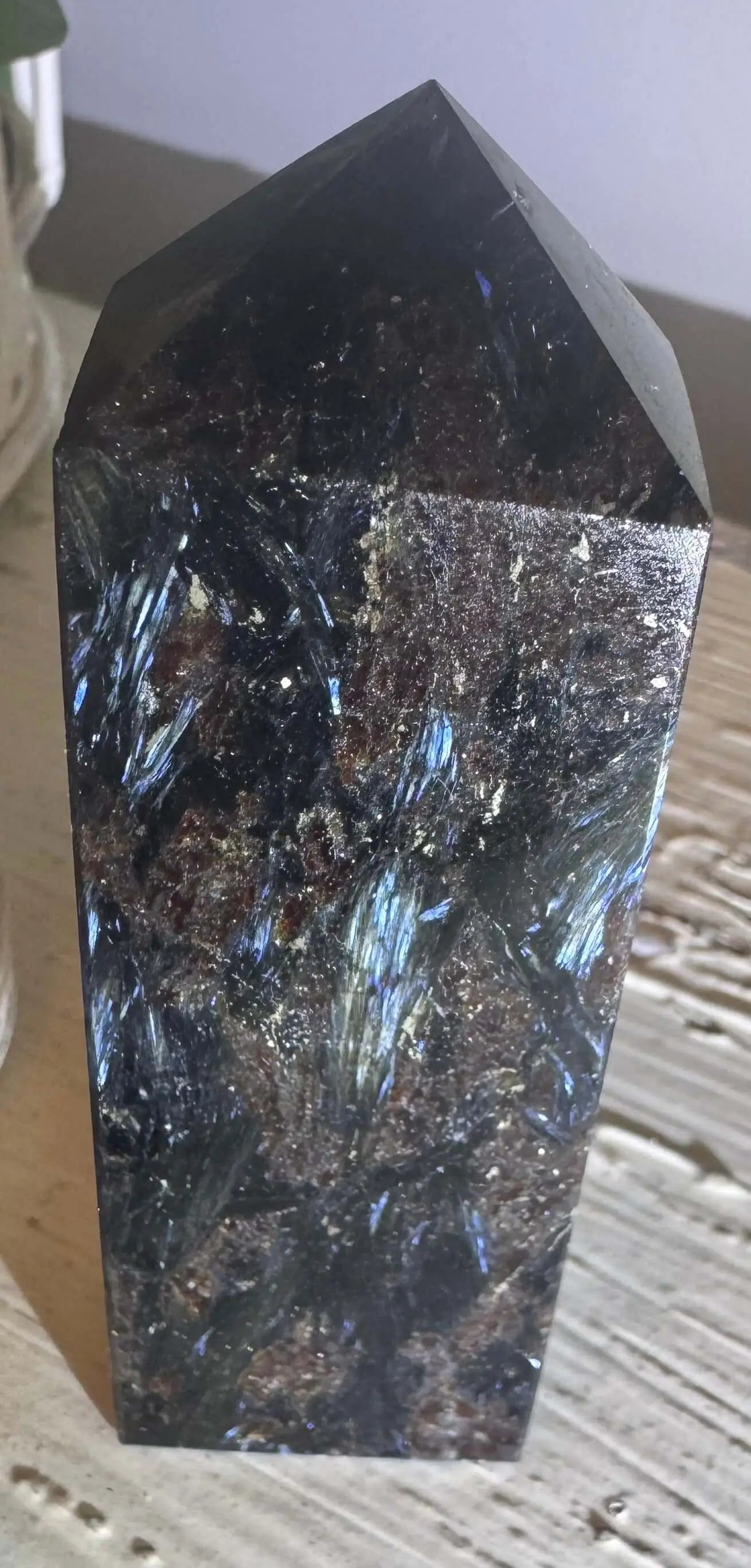 Arfvedsonite crystal set with dark mineral specimens
