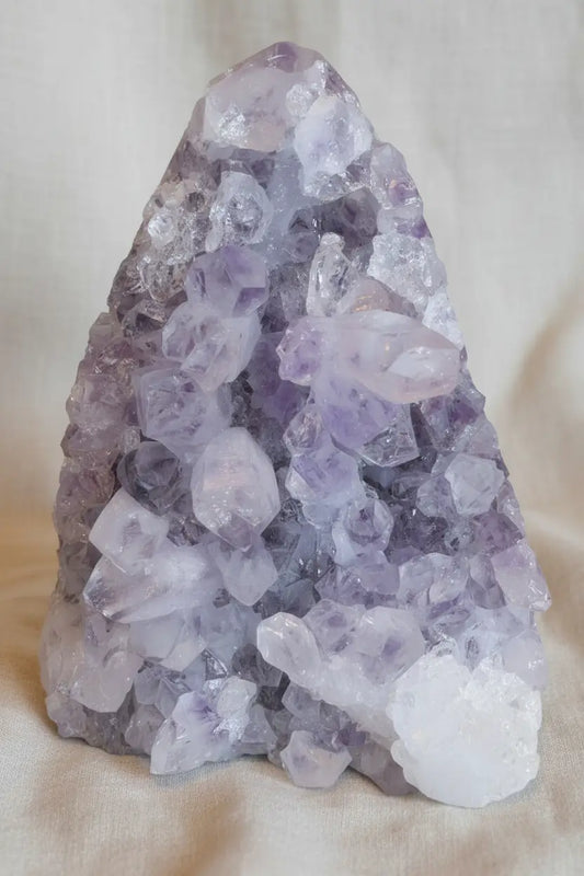 Amethyst on an off white backdrop 