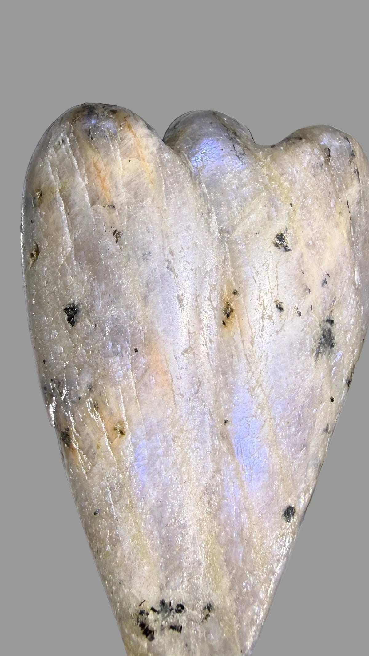carved angel from moonstone crystal showing blue flash