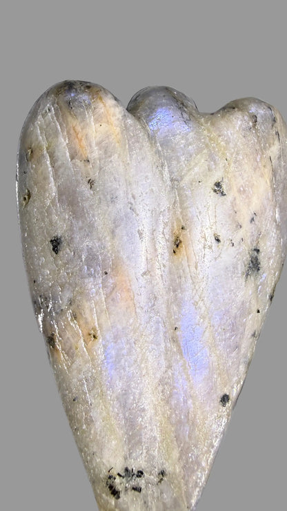 carved angel from moonstone crystal showing blue flash