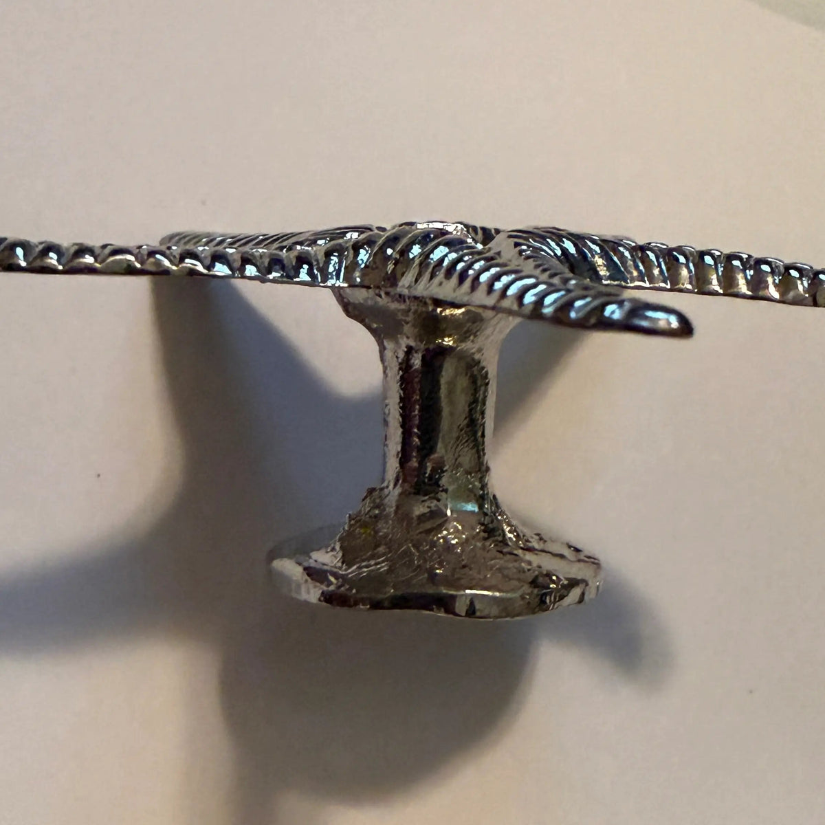 side view, close up of starfish petite sphere display stand - photo shows the pedestal 