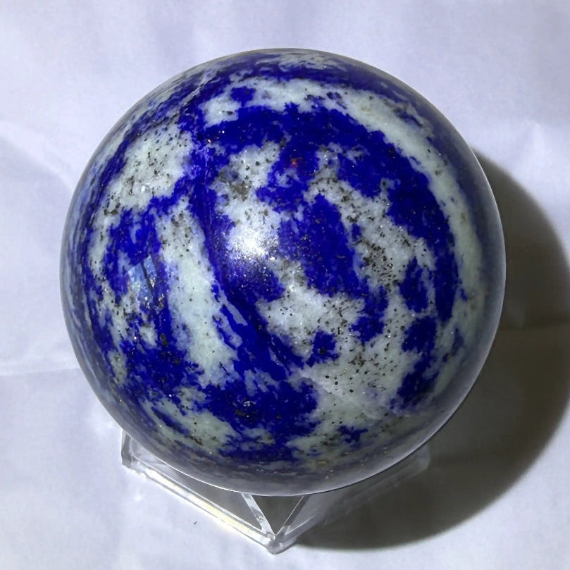 natural lapis lazuli carved sphere, deep blues, white and pyrite 
