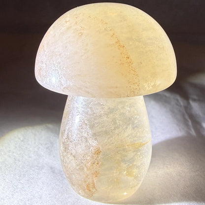 Close up of citrine mushroom. hand carved bright yellows and natural inclusions. Photo not enhanced by AI