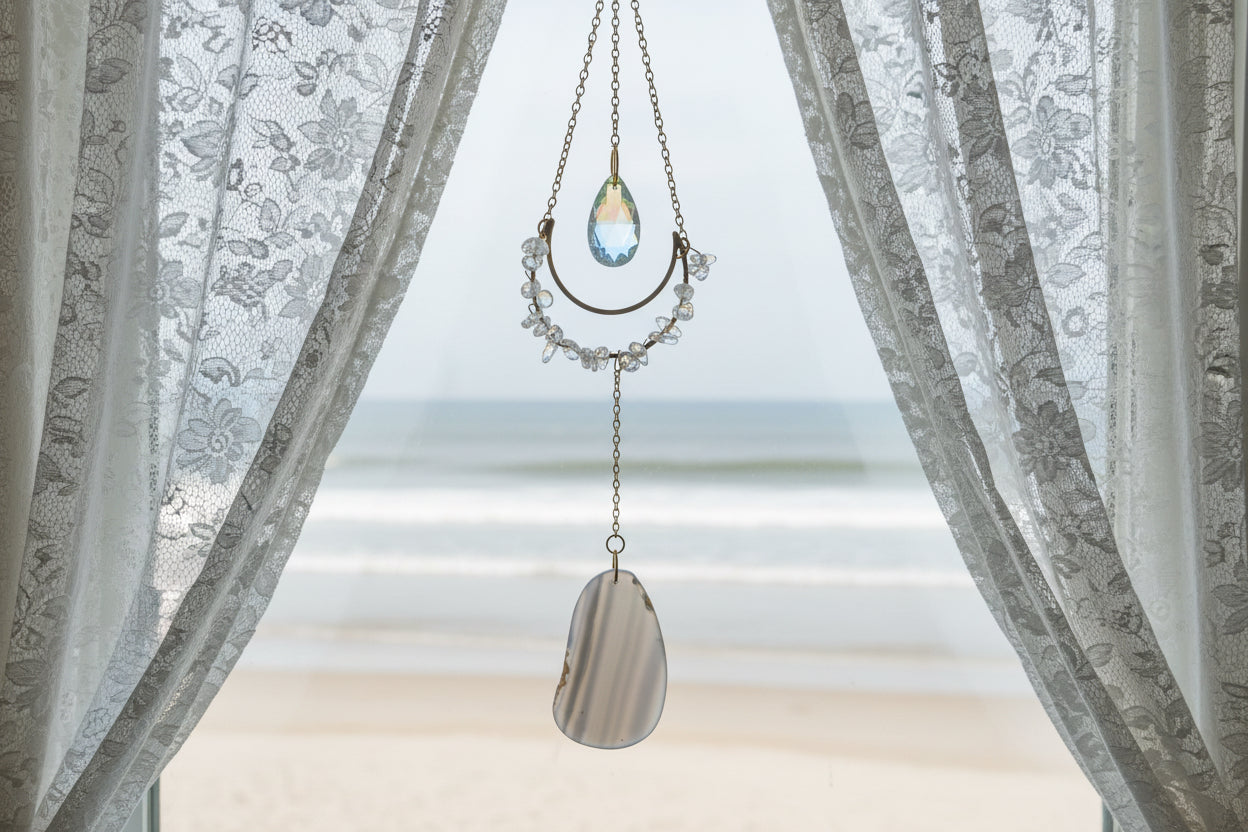 Clear Quartz and Agate Suncatcher Crystal Window Prism on wooden background