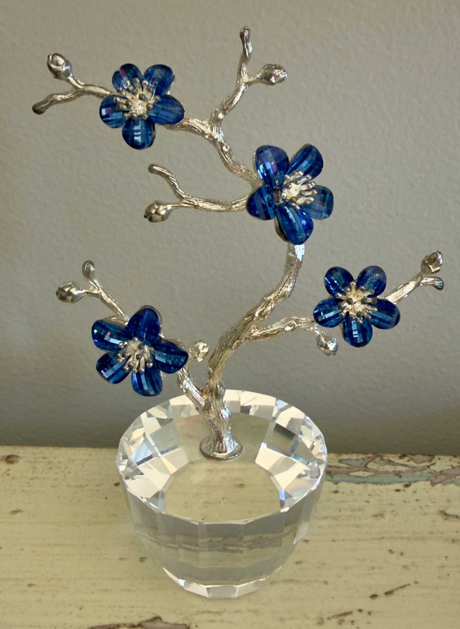 Blue crystal blossom tree in a crystal vase for throat chakra healing