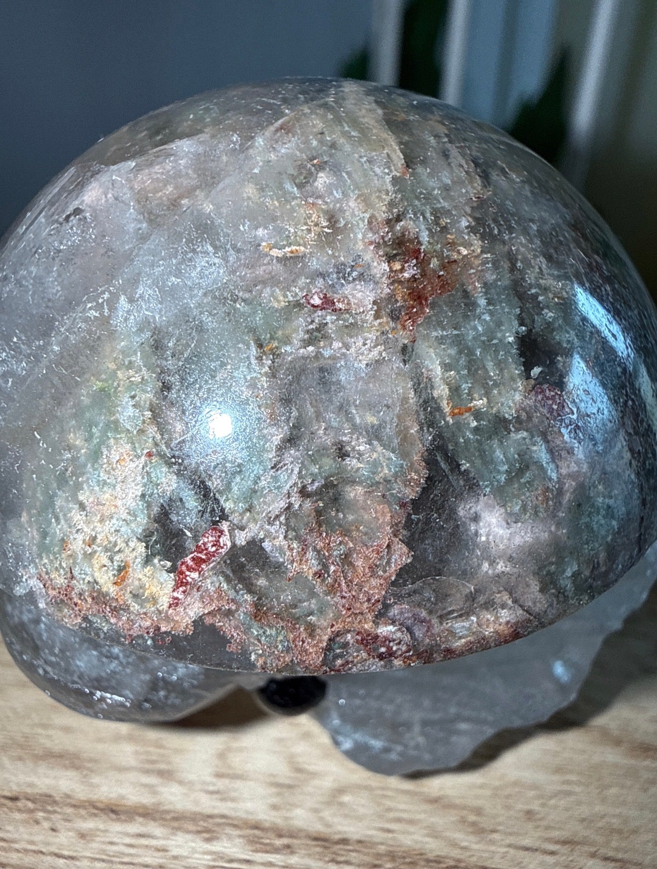 Garden Quartz Carved Elephant (B) with intricate patterns on wooden surface