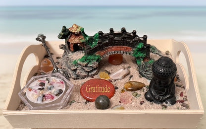 Mini Zen Garden, wood tray filled with sand, candle,and assorted crystals and buddha figure