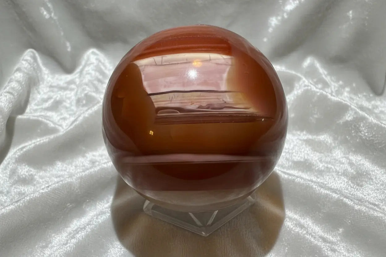 Carnelian sphere with orange banding display view