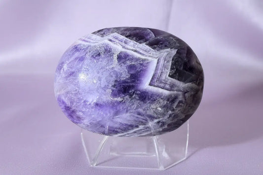 Chevron Amethyst palm stone with purple white and pyrite inclusions