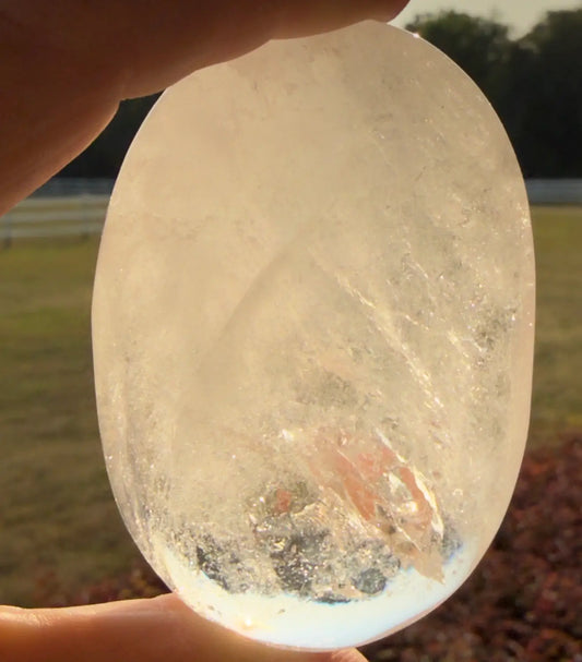 Clear Quartz polished stone with natural inclusion rainbows