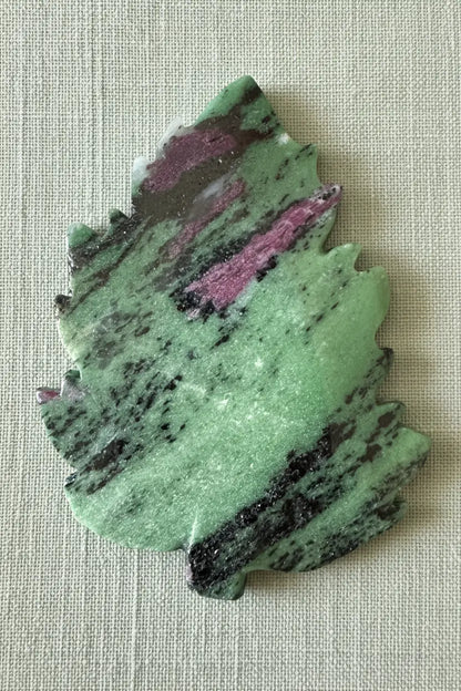 Ruby Zoisite carved leaf slab back side with green and red tones