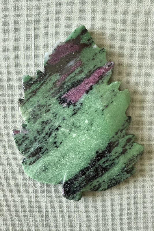 Ruby Zoisite carved leaf slab back side with green and red tones