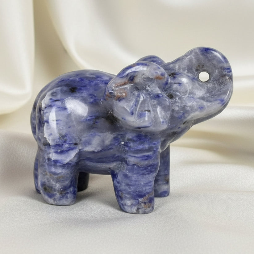 A carved elephant figurine made of lapis lazuli crystal 