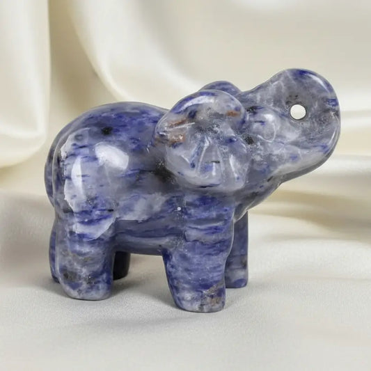 A carved elephant figurine made of lapis lazuli crystal 