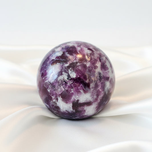 A polished lepidolite purple  crystal sphere  