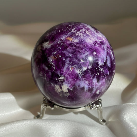 Close up dark purple lepidolite sphere