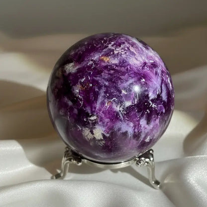 Close up dark purple lepidolite sphere